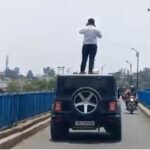 युवक ने चलती थार की छत पर खड़े होकर बनाई रील, वीडियो वायरल